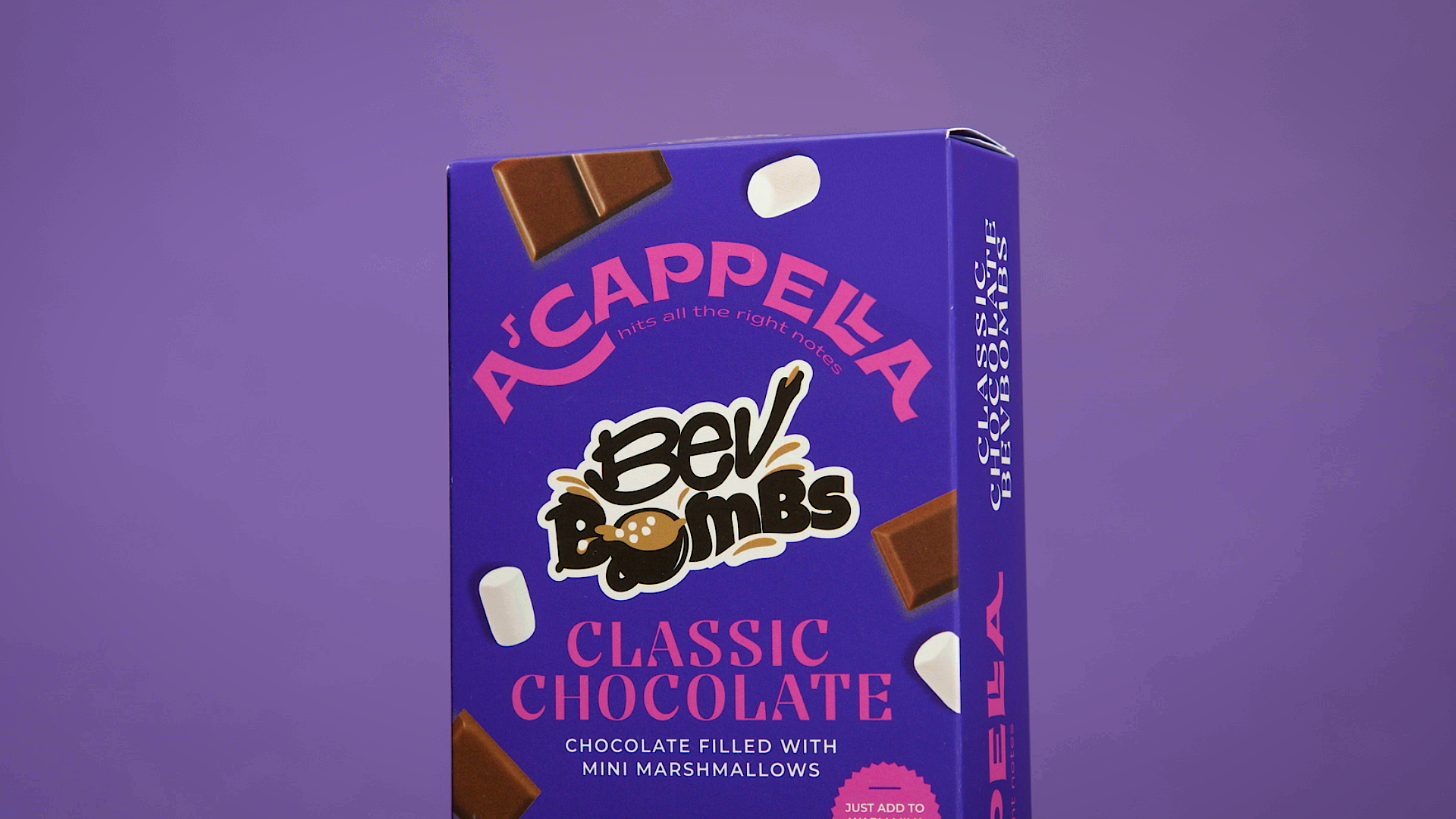 Box of A'cappella Chocolate Classic Chocolate BevBombs on a purple background